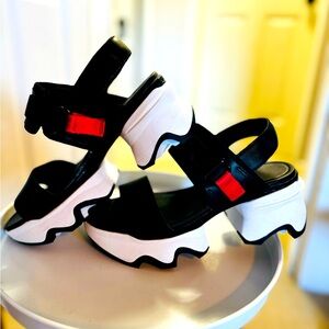 SOREL Kinetic impact wedge sandal